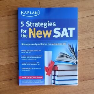 Kaplan SAT Prep Guide with Blue and Yellow Cover